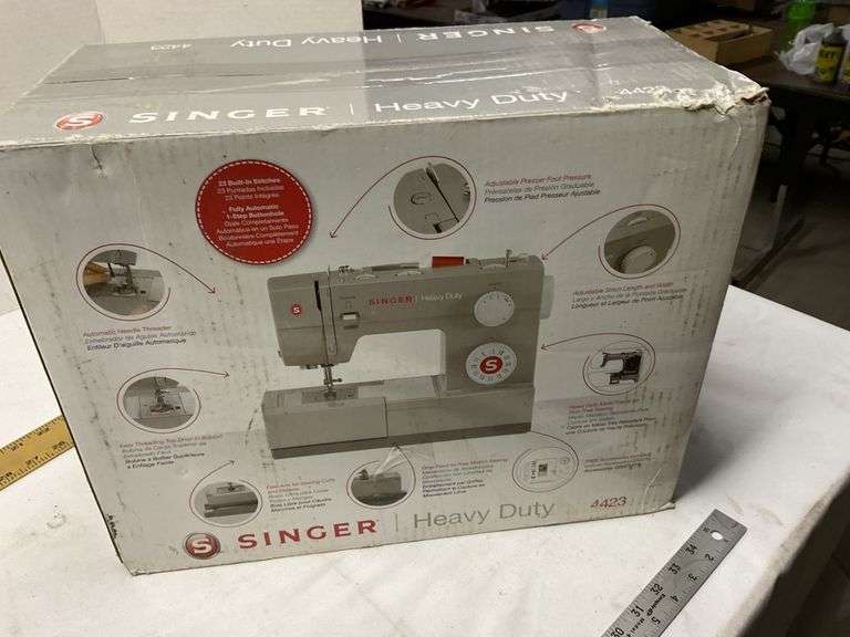 Singer heavy duty sewing machine Legacy Auction Company
