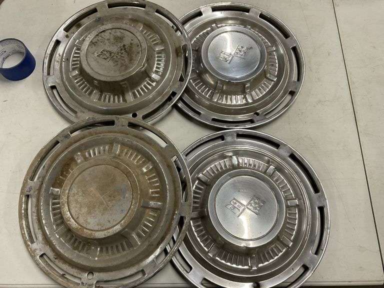 Chevy hubcaps Legacy Auction Company