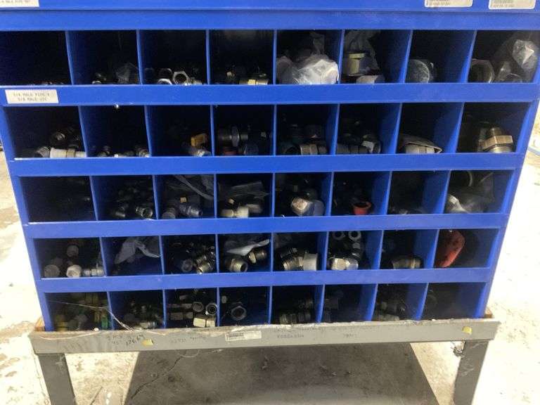 Fastenal bins with hydraulic fittings and elbows. Legacy Auction Company