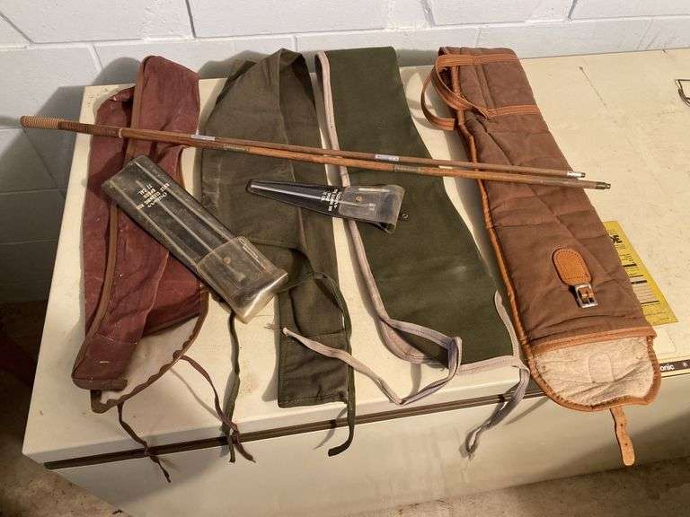 Gun cases and gun cleaning rods Legacy Auction Company