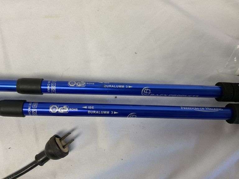 Hiking poles and electric worm rod Legacy Auction Company