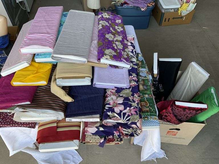 Bolts of fabric Legacy Auction Company