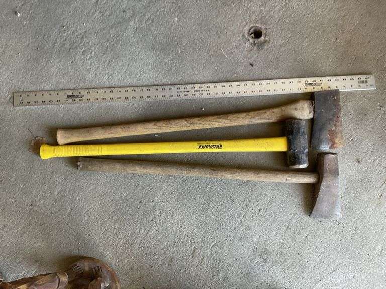 Axes and sledge hammer Legacy Auction Company