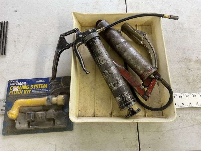 Two grease guns, spout and cooling system flush kit Legacy Auction