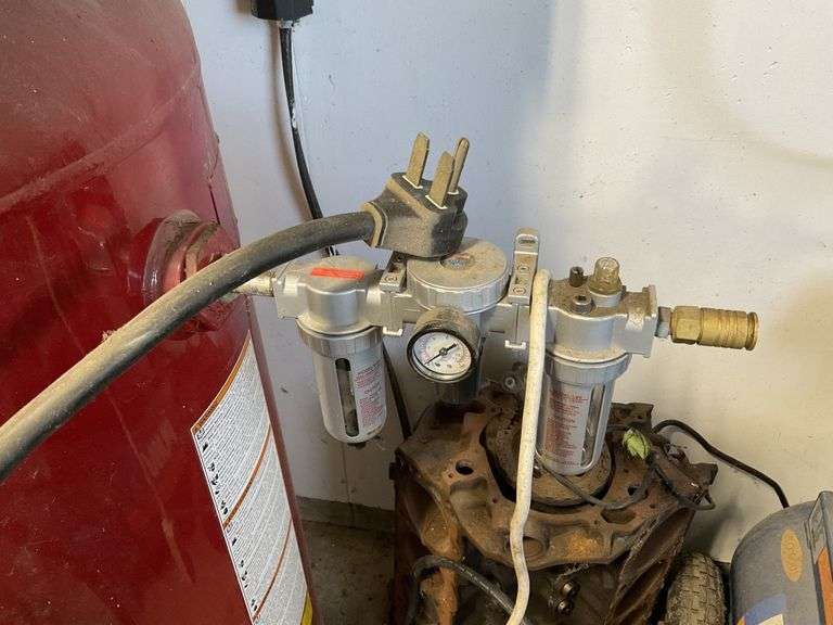Coleman PowerMate magna forced air compressor. 80 Legacy Auction Company