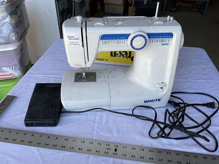 White sewing machine. Jeans machine one step Legacy Auction Company