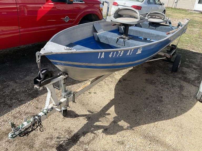 1968 14’ Lund boat w/1971 shore lander boat Legacy Auction Company