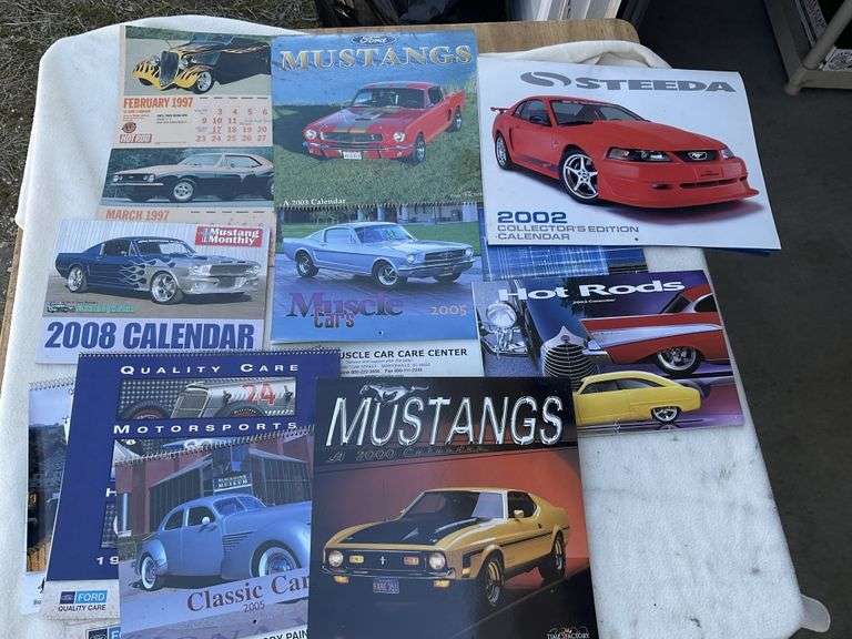 Car calendars. Legacy Auction Company