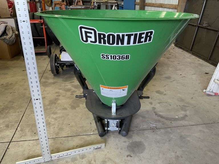 Frontier three point PTO broadcast spreader. Near Legacy Auction Company