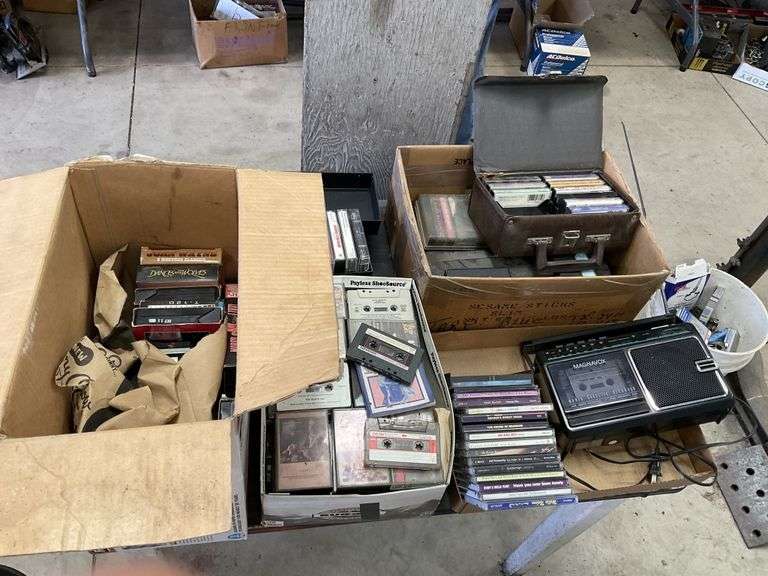 VHS tapes, cassette tapes and CDs with Magnavox Legacy Auction Company
