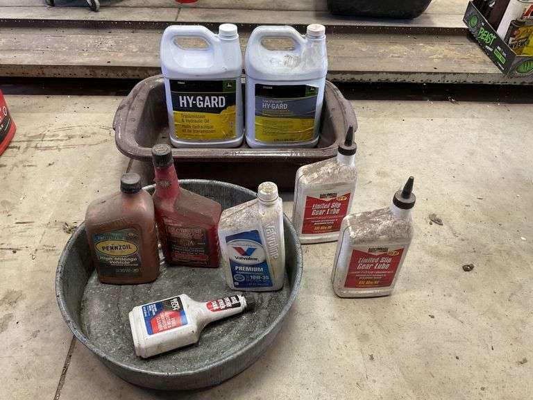 John Deere hygard hydraulic oil. One full and Legacy Auction Company