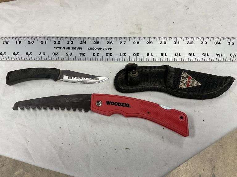 Buck whitetails Unlimited knife and Tree saw Legacy Auction Company