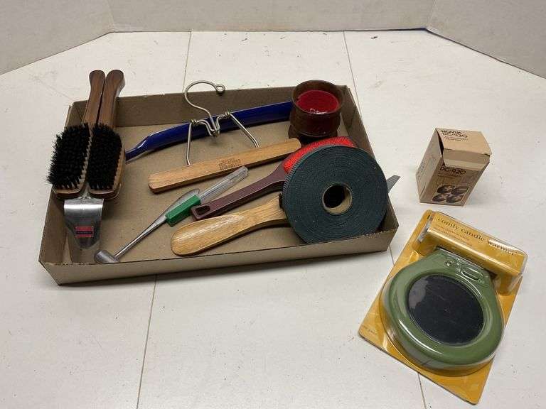 Lint brushes, hanger etc. Legacy Auction Company