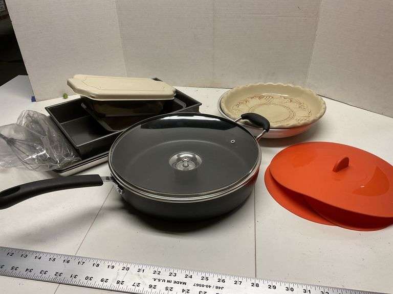 Baking pans, skillet, pie plates and pan covers Legacy Auction Company
