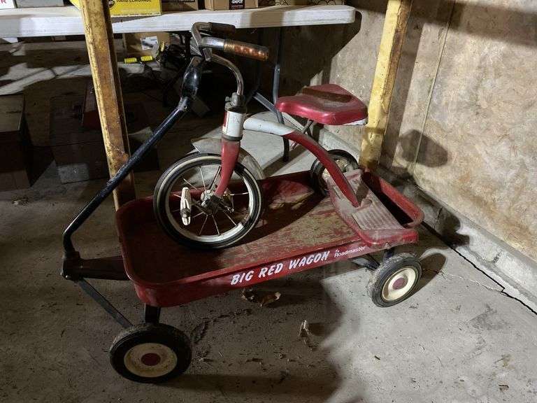 Big red wagon and tricycle, as is! Legacy Auction Company