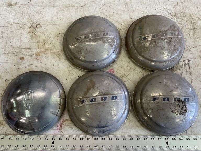 Vintage hubcaps Legacy Auction Company