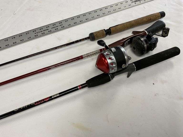 3 fishing rods and reels Legacy Auction Company