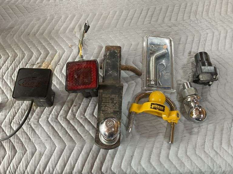 Receiver lights, hitch pin and clip, balls etc. Legacy Auction Company
