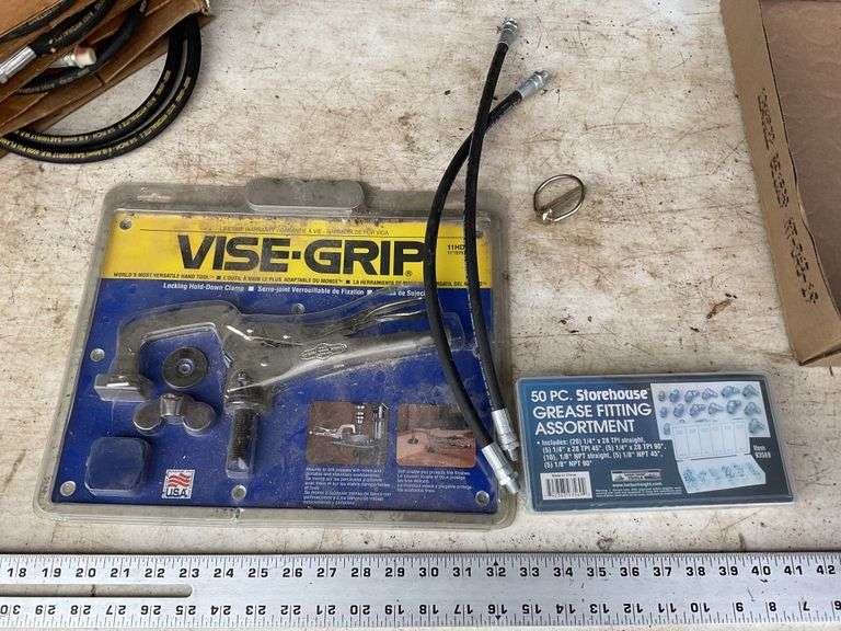 Vise grips, grease fitting assortment etc. Legacy Auction Company