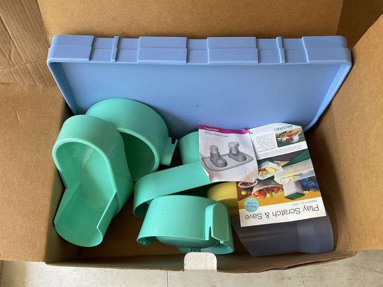 Tupperware pet feeding center Legacy Auction Company