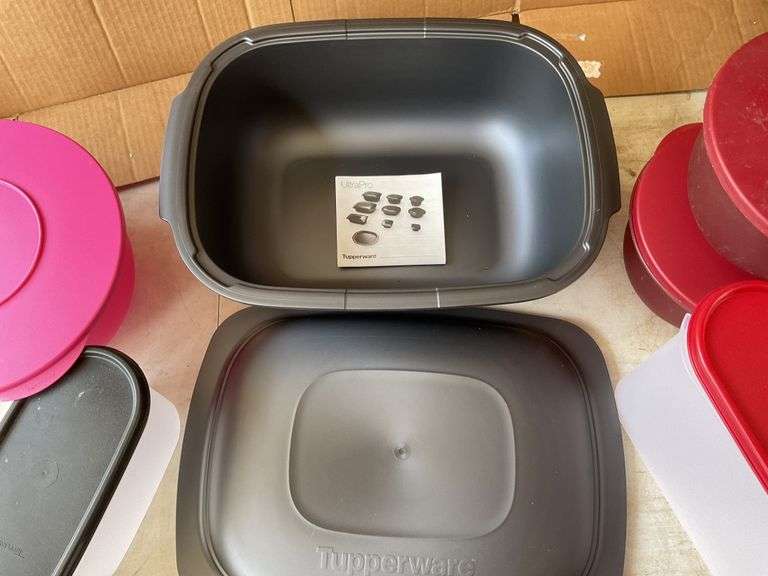 Tupperware containers, knife, utensil holder Legacy Auction Company