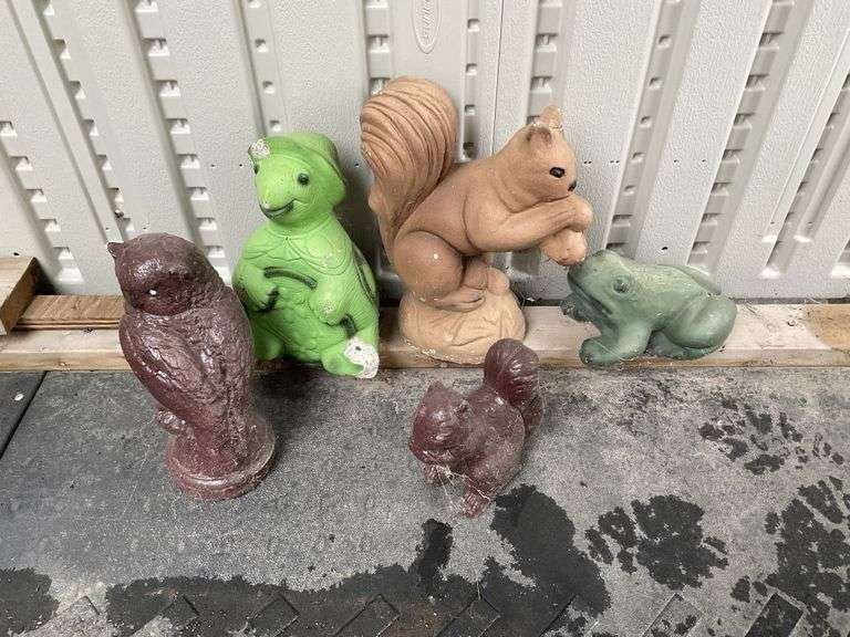 Cement lawn ornaments Legacy Auction Company