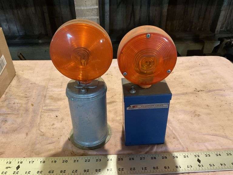 Flashing battery lights Legacy Auction Company