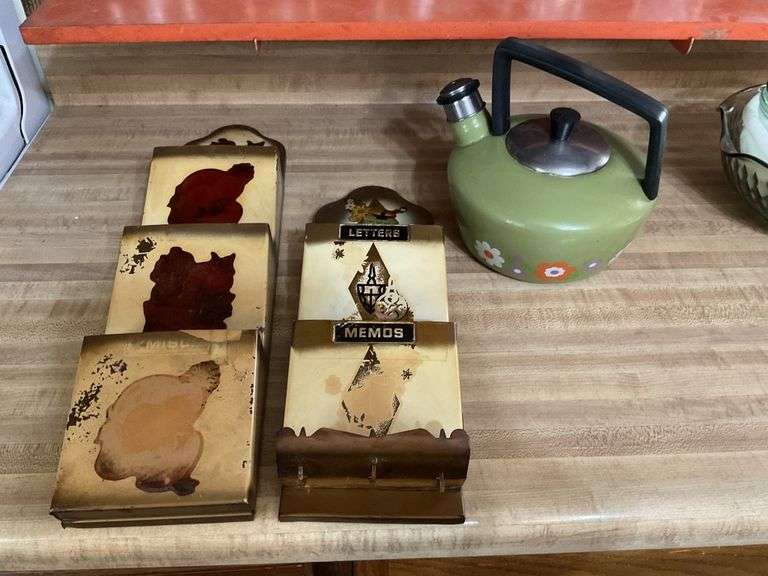 Letter holders, teapot Legacy Auction Company