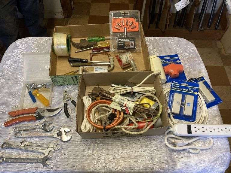 Misc tools, power cords, misc Legacy Auction Company