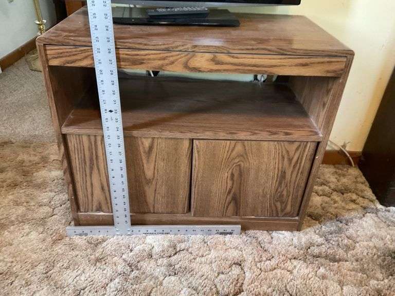 32 inch Toshiba TV with remote and stand Legacy Auction Company