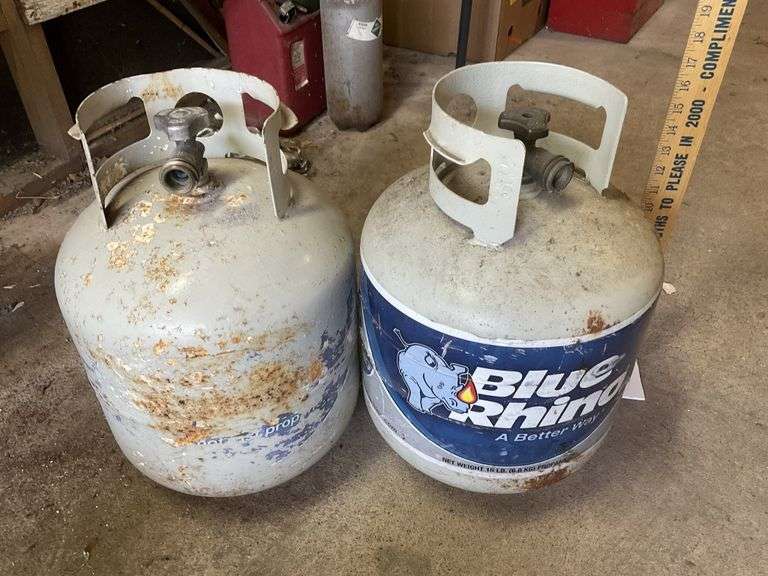 2 propane tanks, one partially full Legacy Auction Company