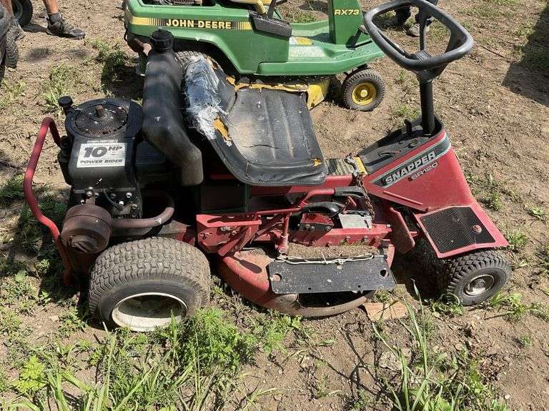 Snapper SR120 mower. Parts mower Legacy Auction Company