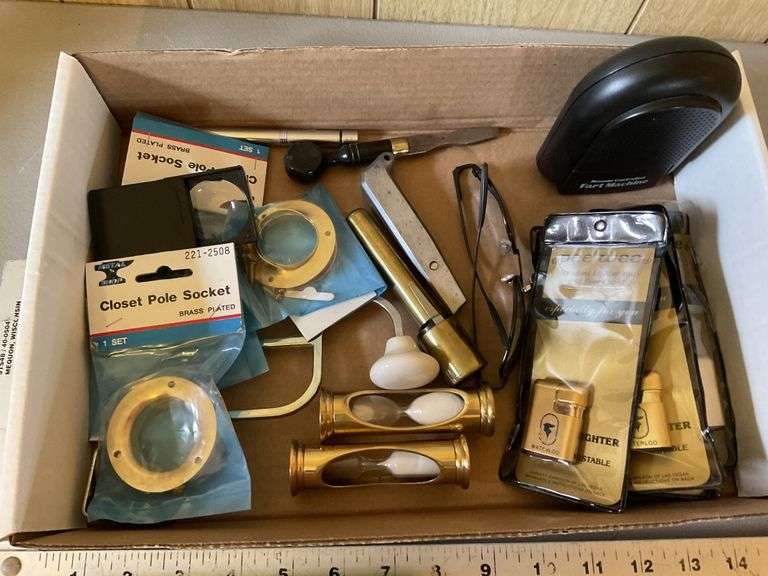 Flashlights, lighters, skull shift knob, misc Legacy Auction Company