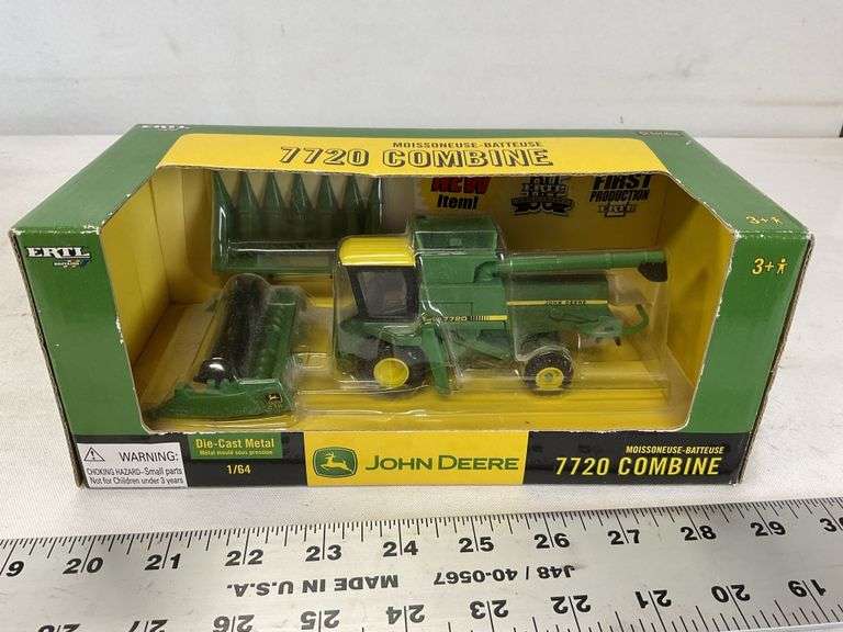 John Deere 7720 combine Legacy Auction Company