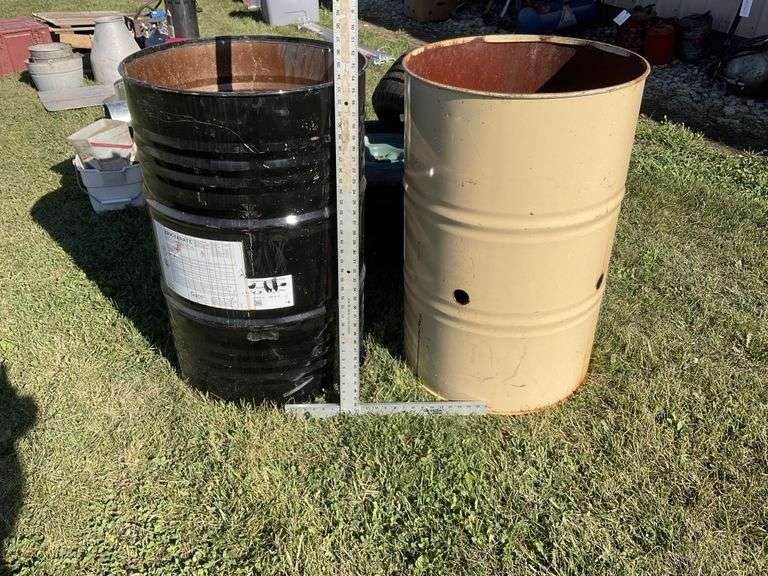 Two burn barrels Legacy Auction Company