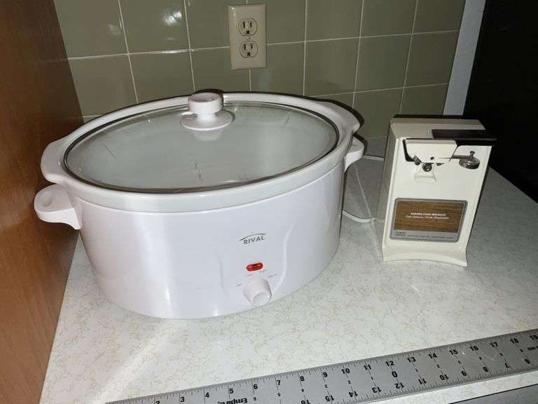 Rival crock pot, has a crack and can opener Legacy Auction Company