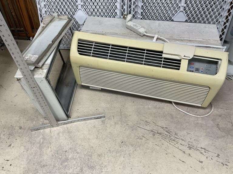 Amana heating and cooling unit with filter box Legacy Auction Company