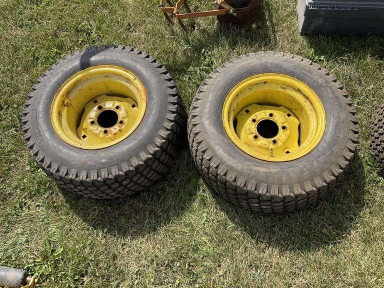 2 lawn tractor, tires and rims Legacy Auction Company