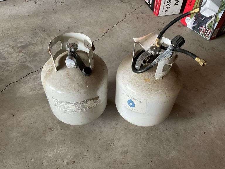2 propane tanks, grill attachment Legacy Auction Company