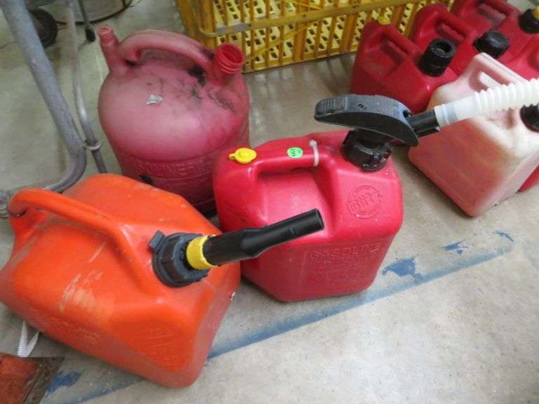2 Gallon Gas Can and Two 2.5 Gallon Gas Cans Lambrecht Auction, Inc.