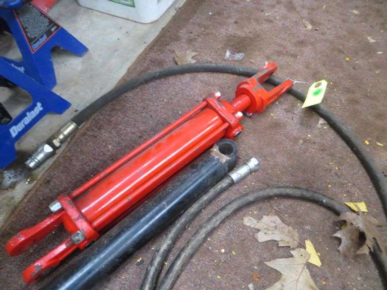 Two Hydraulic Cylinders Lambrecht Auction, Inc.