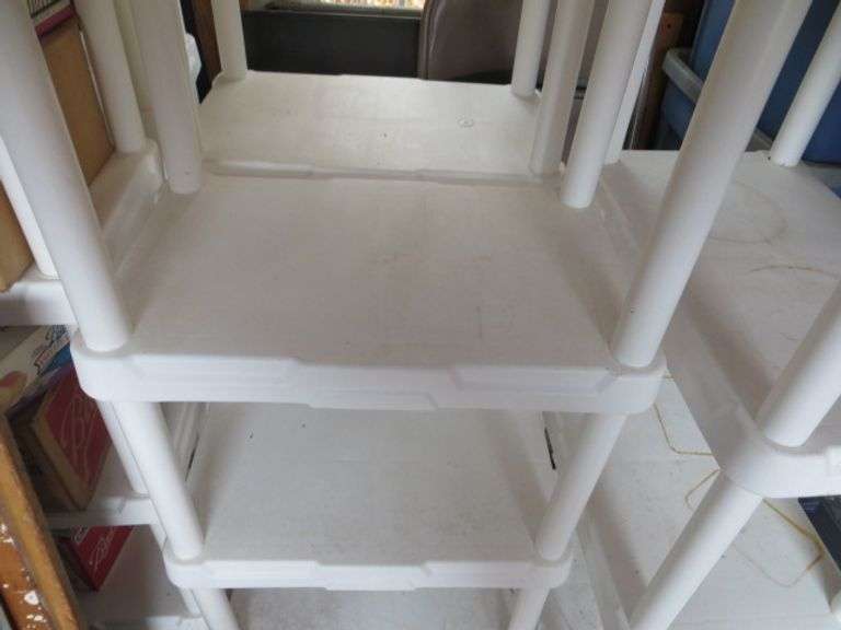 Nine Small Plastic Shelves Lambrecht Auction, Inc.