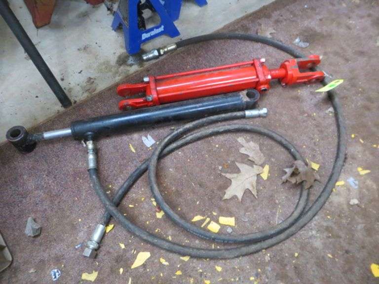 Two Hydraulic Cylinders Lambrecht Auction, Inc.