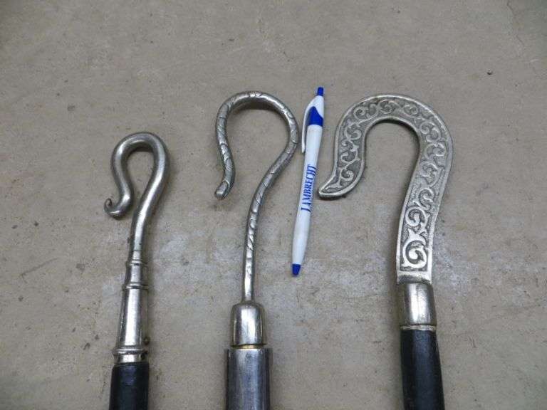 Three Long Staffs With Hooks Lambrecht Auction, Inc.