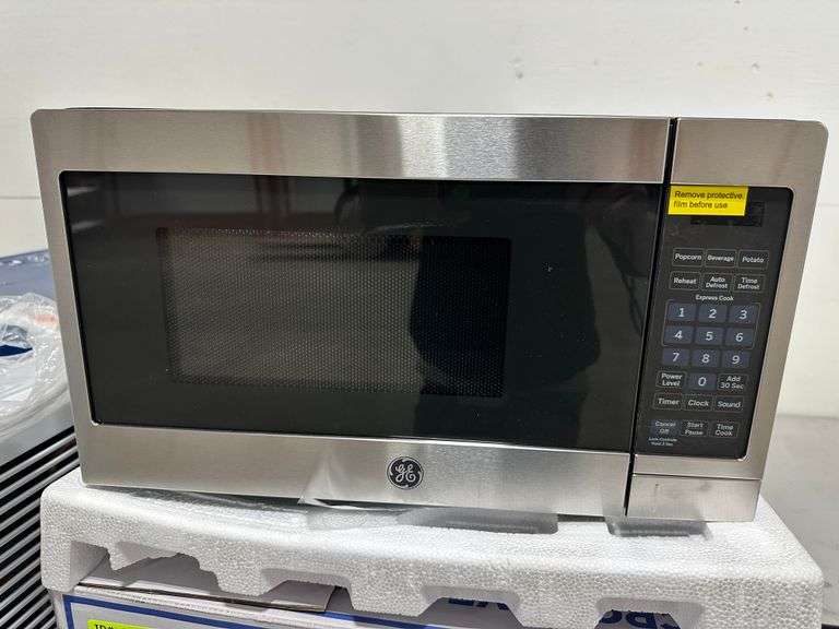 GE Microwave Oven .7Cu. Ft. 700 Watts Lambrecht Auction, Inc.