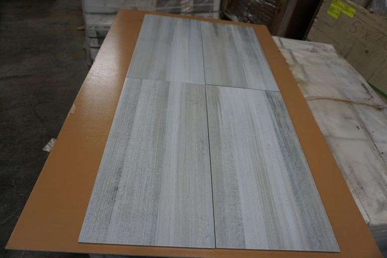 Rhodes Ivory Blend Porcelain Tile 12" x 24" - Lambrecht Auction, Inc.