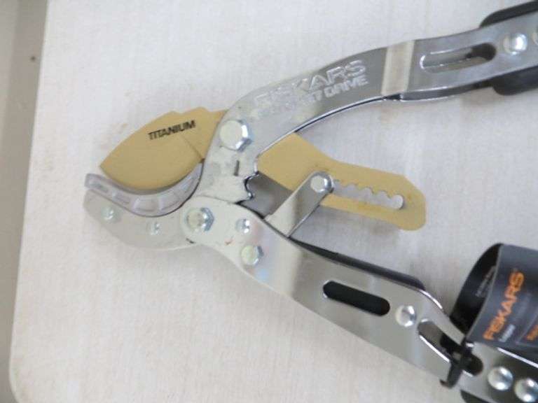 Fiskar's Loppers And Bow saw Lambrecht Auction, Inc.