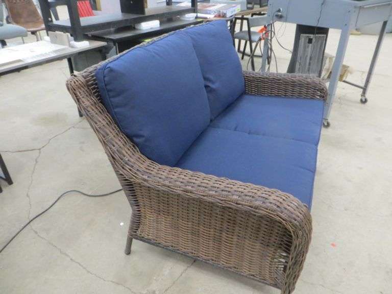 Hampton Bay Wicker Sofa With Navy Cushions Lambrecht Auction, Inc.