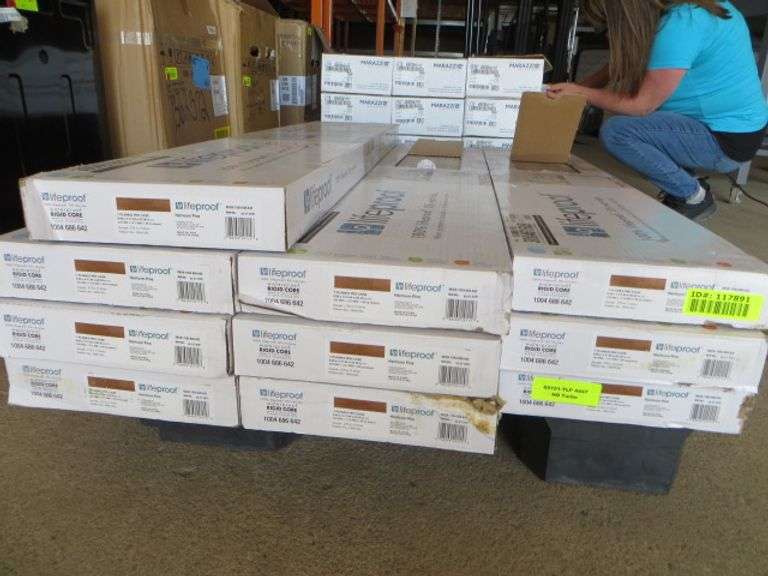LifeProof Viynl Plank Flooring Heirloom Pine - Lambrecht Auction, Inc.