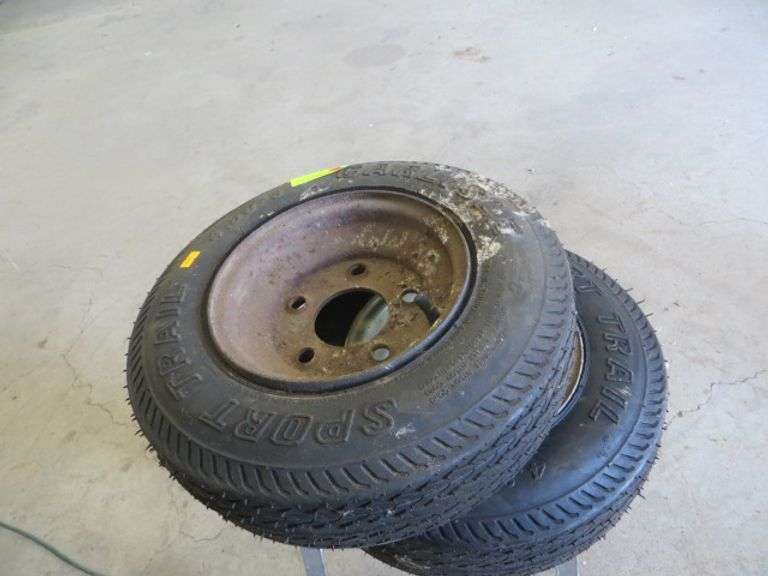 Pair of 4308 Trailer Tires and Wheels Lambrecht Auction, Inc.